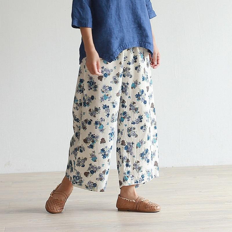 Buddha Trends beige con flores azules / L Periwinkle floral pantalones palazzo de cintura alta