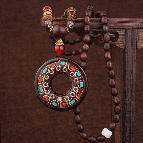 Buddhatrends Wheel of Dharma Collar de madera hecho a mano
