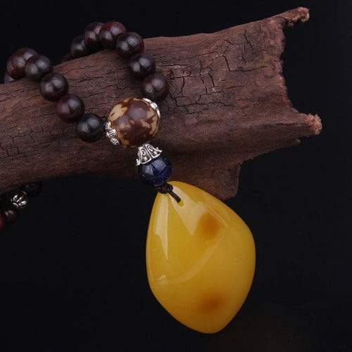 Buddhatrends Sandelholz-Halskette aus gelbem Stein